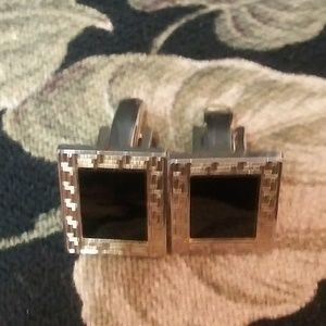 Gold and black suit cuff links